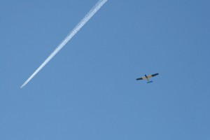 Shot of the PEC V5 Prototype in frame with some jet contrails