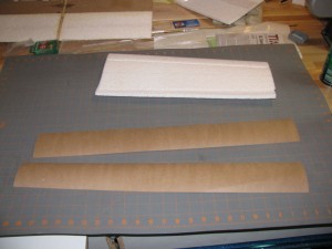 Cutting kraft paper strips to width